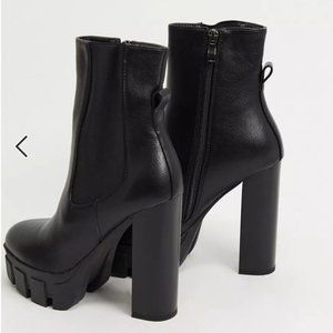 Heeled ankle boots with chunky soles in black